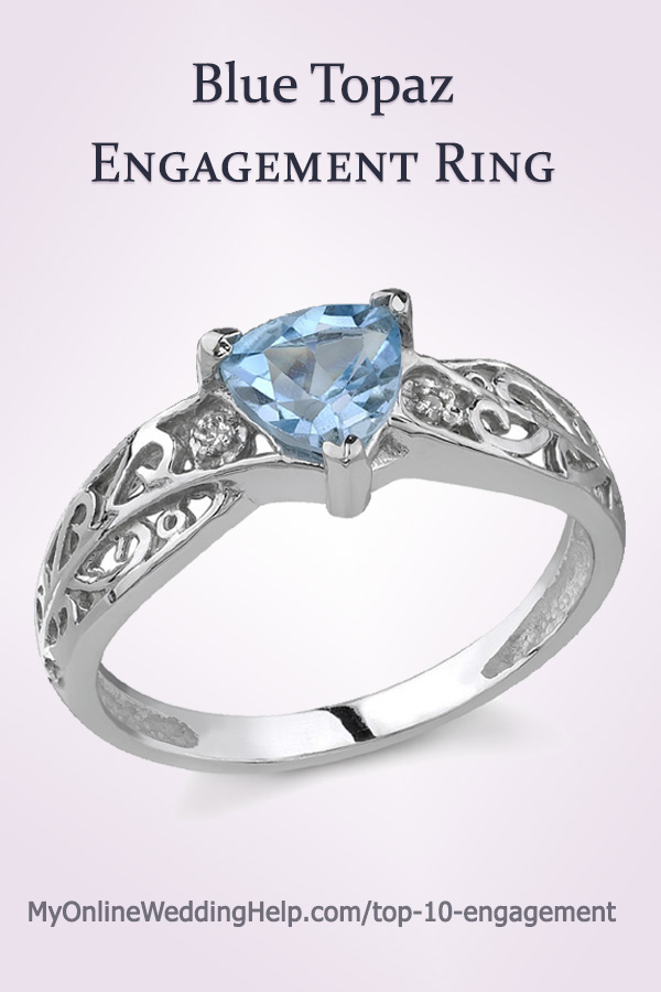 Blue Topaz and Diamond Engagement Ring. Solid 14K white gold.