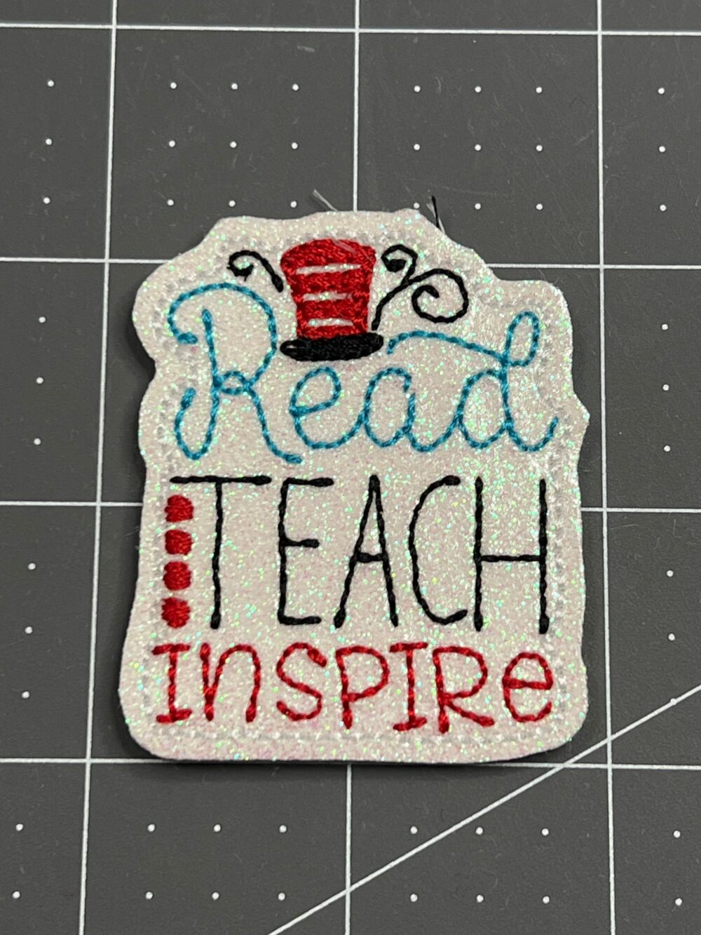 Glitter Read Teach Inspire Felties, Reading School Wholesale Badge Reel Covers, Coffee Cozies, Planner