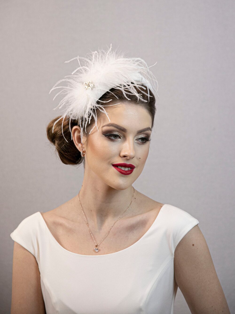 Feather Fascinator Hat. White Wedding
