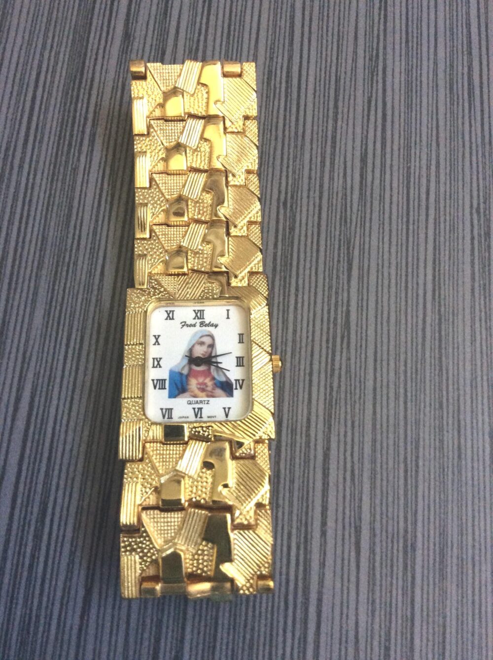 Men's Gold Religious Watch Rectangle White Virgin Mary Dial Roman Numeral Hours On A Nugget Linked Band Vintage Un-Used New/Old Stock